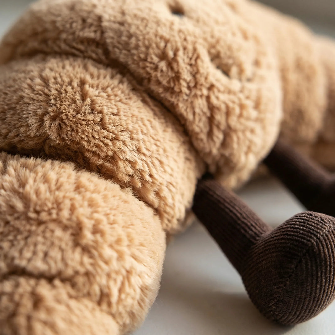 SnuggleCroiss - Plüschiges Kuscheltier Kissen Decorique.de